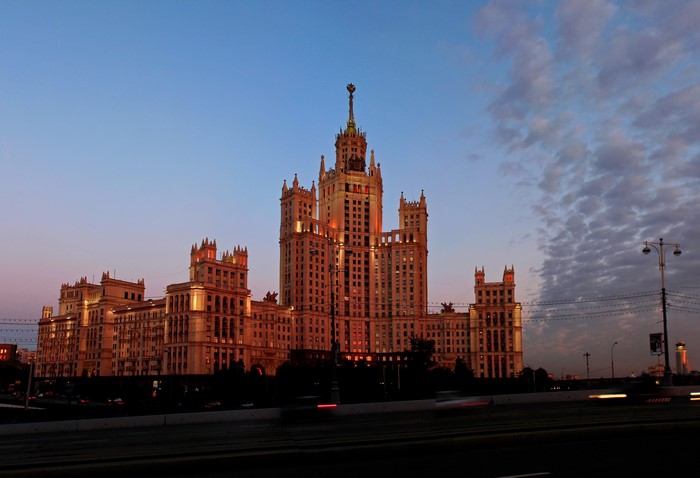 Stalinist skyscraper in Moscow, Russia at dusk