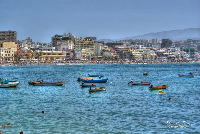 Boats in the sea with Las Palmas cityscape, Canary Islands
