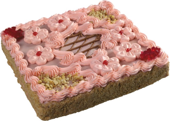 Square pink frosted cake with floral decorations