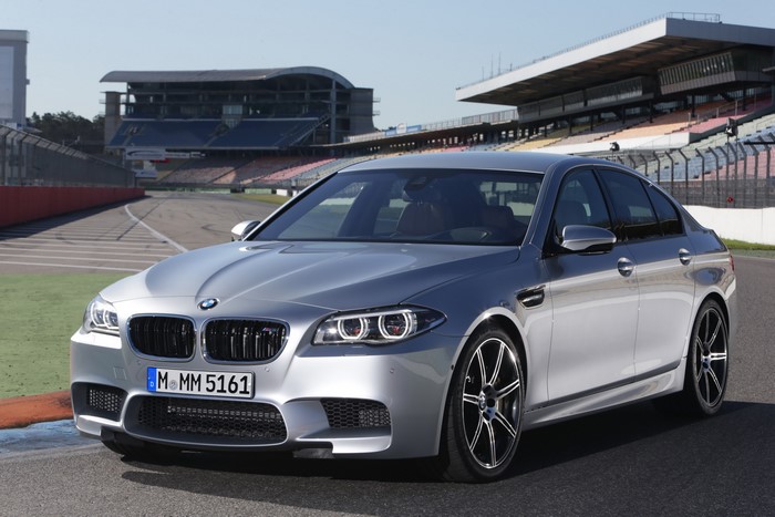 Silver 2013 BMW M5 F10 on a Race Track