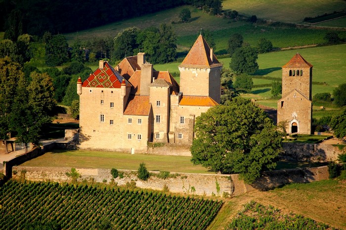 Château de Pierreclos and church in Burgundy, France