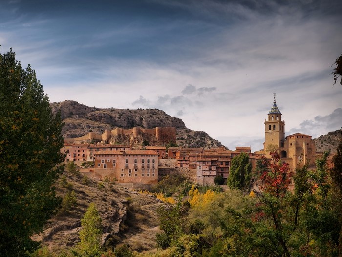 Albarracin town with church tower and castle walls, Spain