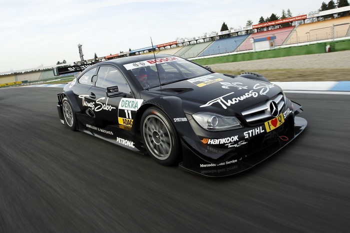 Black Mercedes-Benz DTM race car on a track