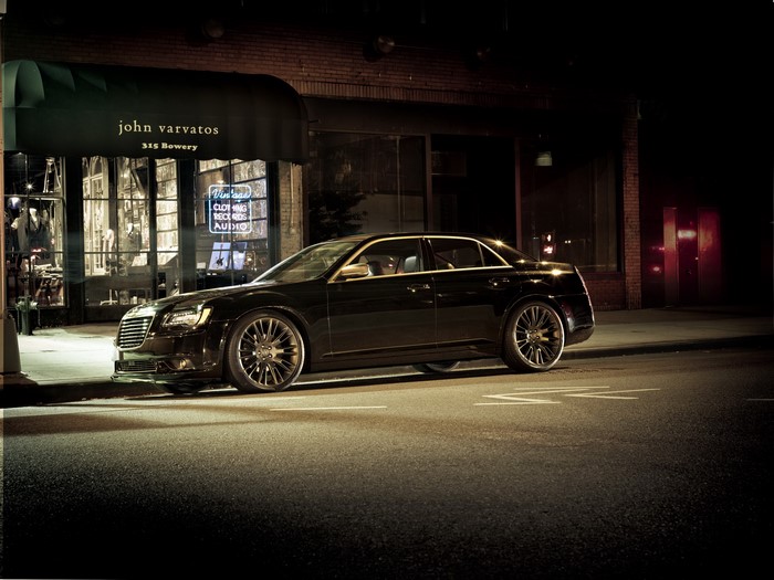 Black Chrysler 300C parked outside John Varvatos store