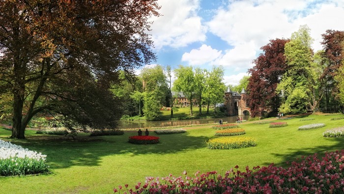 Park with tulips and a castle in Dilbeek, Belgium