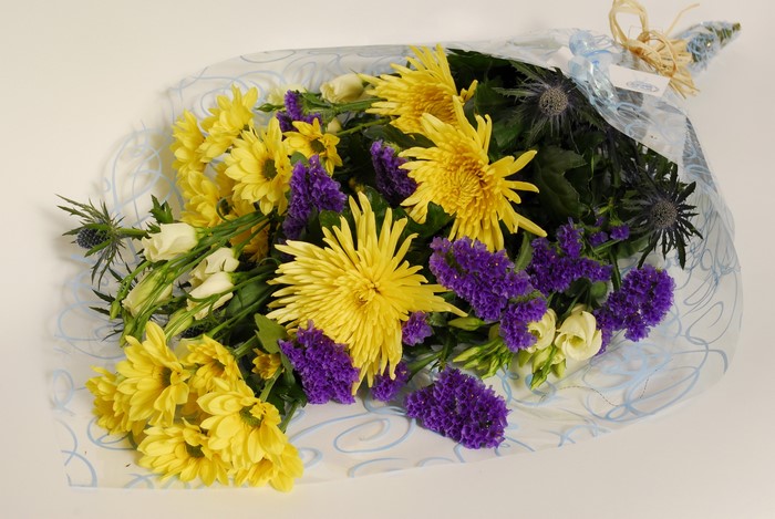 Yellow and purple flower bouquet with thistles