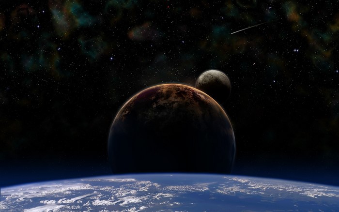 Planets and moons in outer space with nebula