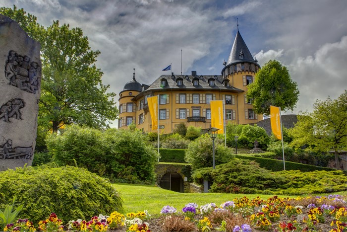 Castle in Mayen, Germany with Sculpture and Flowers