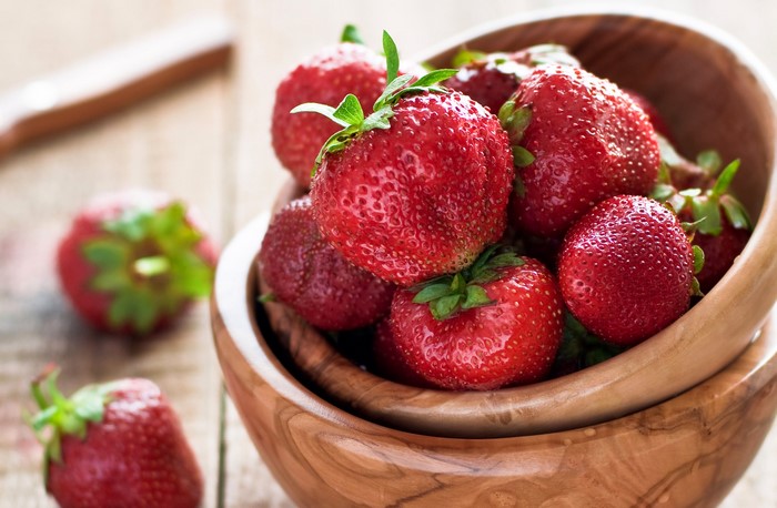 Strawberries in a wooden bowl
