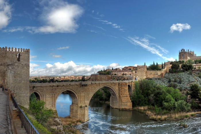 Stone bridge over a river in Toledo, Spain