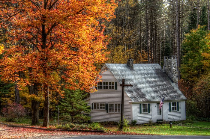 White house with autumn trees in Marshfield, USA