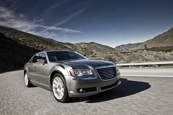 Chrysler 300 sedan driving on a mountain road