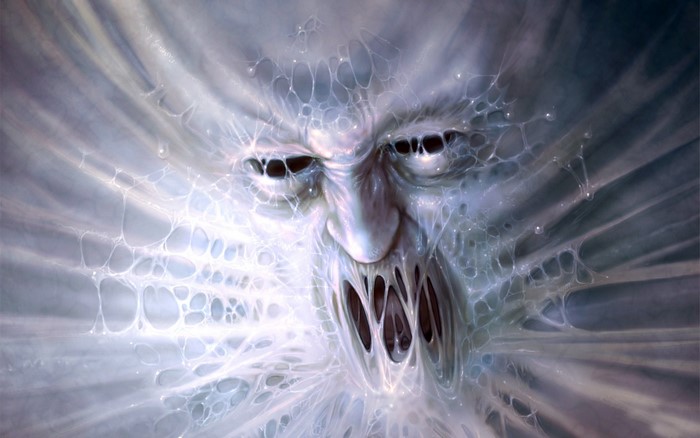 A terrifying monster face emerging from a web-like substance