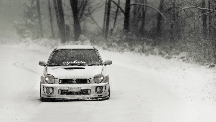 White Subaru Impreza WRX in Snow