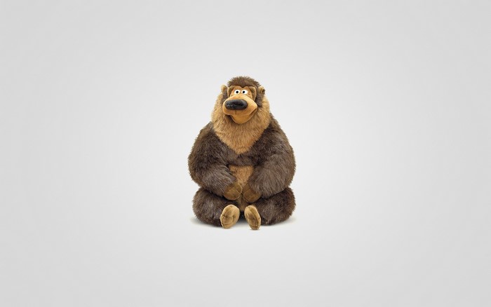 Plush toy bear sitting on a white background