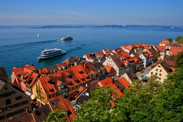 Meersburg, Germany houses overlooking a lake with boats