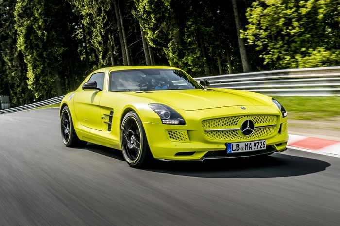 Yellow 2013 Mercedes-Benz SLS AMG Electric Drive on track