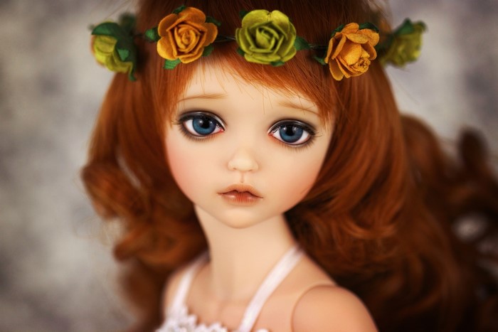 Doll with flower crown and red hair