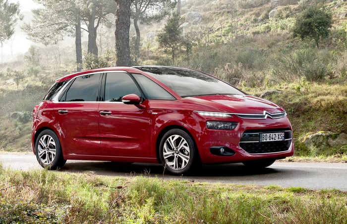 Red Citroen C4 Picasso parked on a road