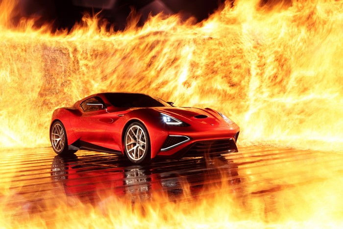 Red 2013 Icona Vulcano sports car in fire