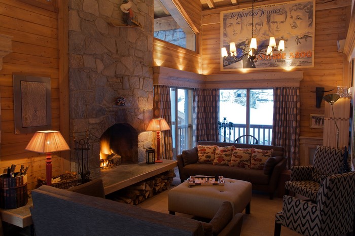 Living room with fireplace and movie poster