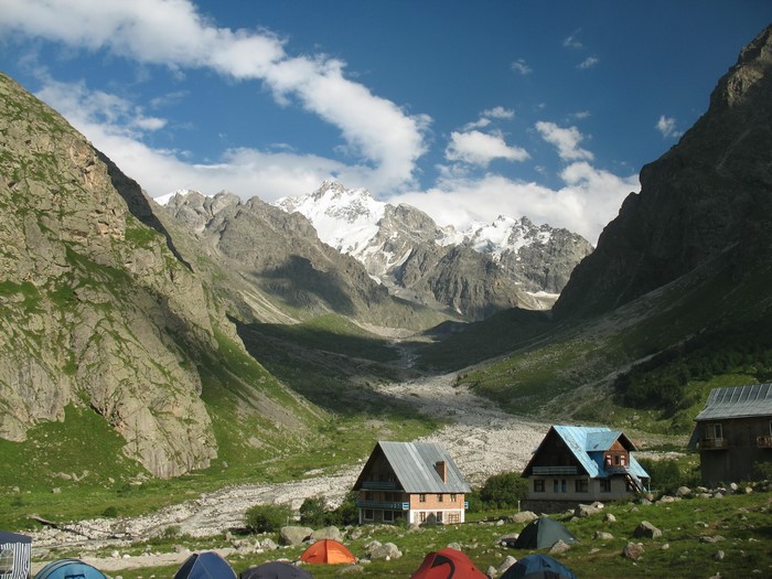Mountain valley with houses and tents in Kabardino-Balkaria, Russia