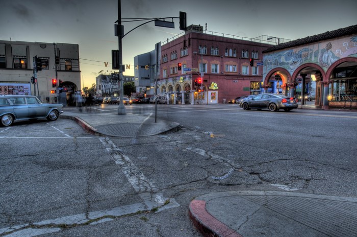 Venice street intersection with cars and buildings