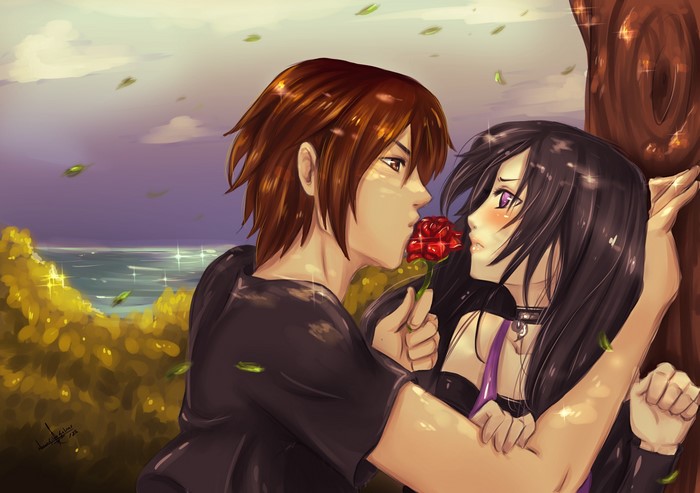 Couple in love with a rose by the sea
