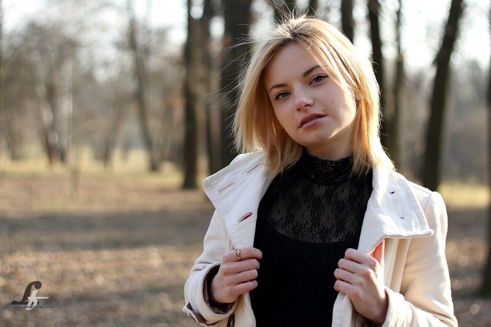 Blonde girl in a park