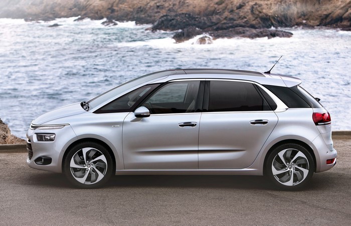 Silver Citroen C4 Picasso parked by the sea