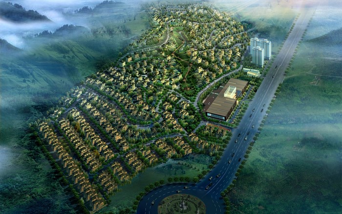 Aerial view of a residential development with a highway