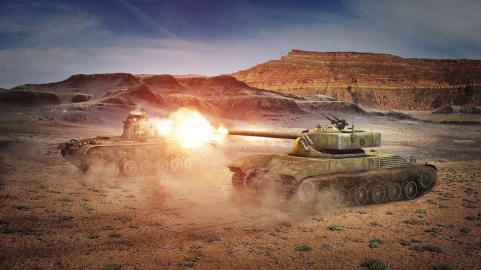 Tanks firing in a desert landscape