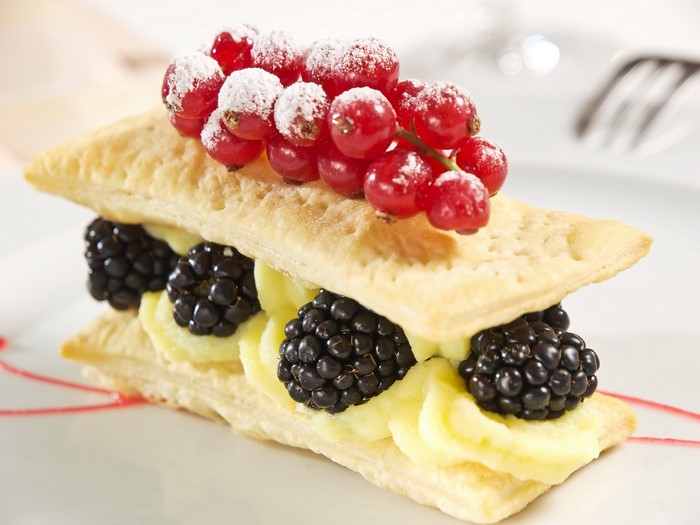 Mille-feuille with blackberries, custard, and currants