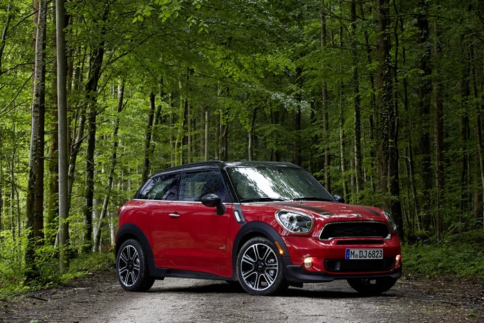 Red Mini Paceman ALL4 Cooper S in a forest
