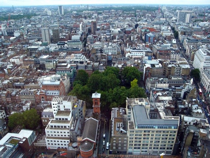 Aerial view of London cityscape with buildings and trees