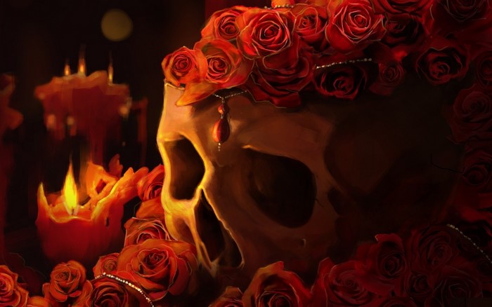 Skull adorned with red roses and a candle