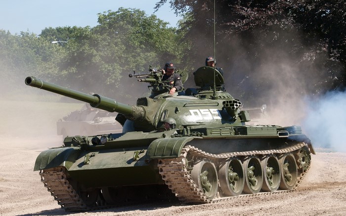 Green tank with crew in action