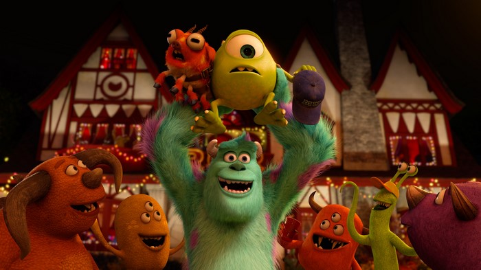 Monsters University characters celebrating outside a house