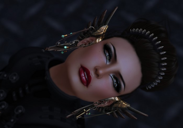 Woman with elaborate headwear and makeup