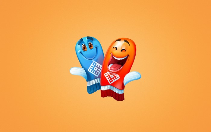 Two cartoon mittens with faces on orange background