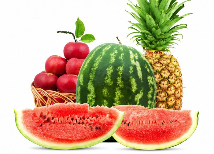 Assortment of fruits including apples, watermelon, and pineapple