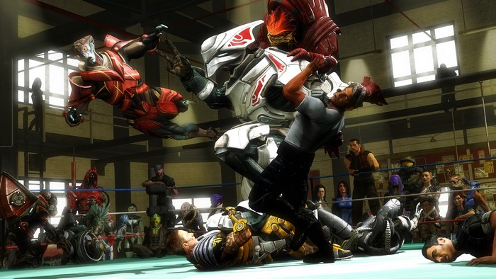 Aliens wrestling in a ring with spectators