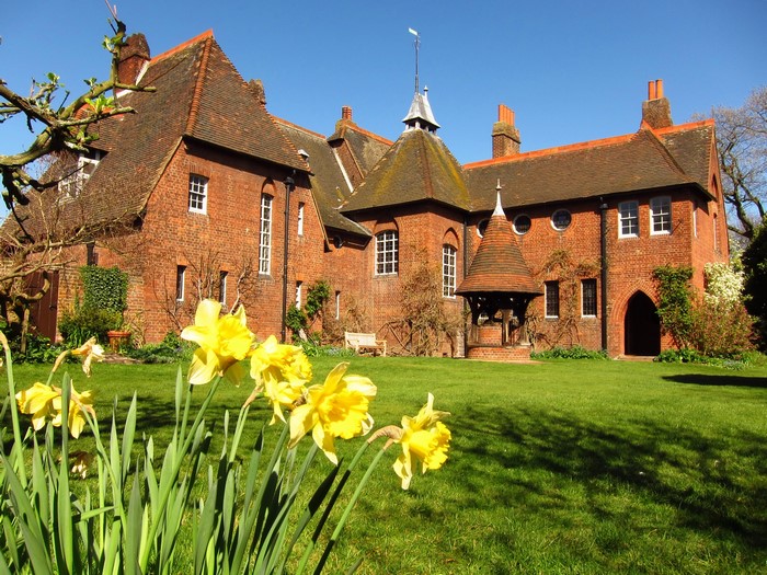 Red brick house with daffodils in Bexleyheath, England