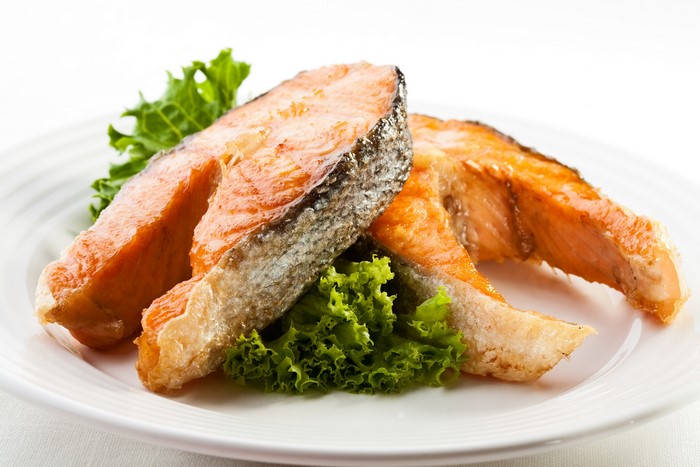 Two Salmon Steaks with Lettuce