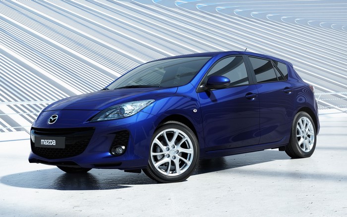 Blue 2011 Mazda 3 hatchback