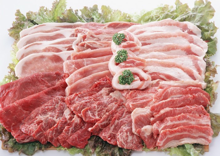 Assortment of raw meat slices and pork belly