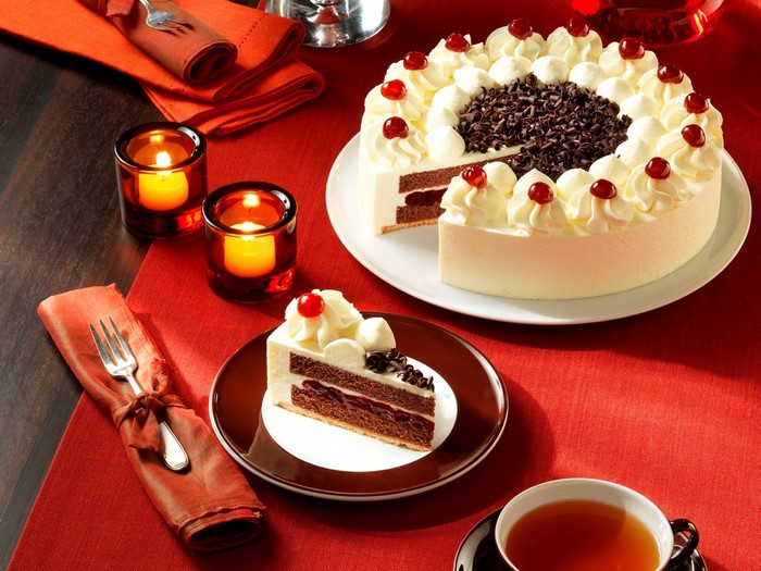 Black Forest Cake with Tea and Candles