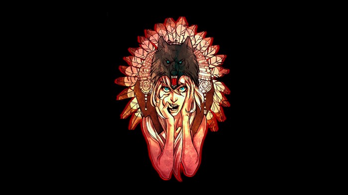 Woman wearing a wolf headdress with feathers