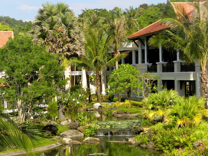 Resort with pond and palm trees in Krabi, Thailand