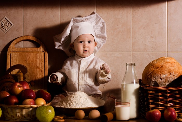 Baby Cook with Flour, Milk, Apples, and Bread